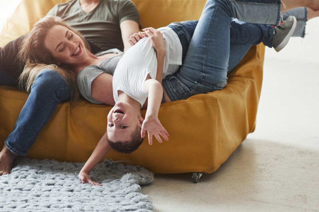 Family enjoys their freshly cleaned furniture and carpets thanks to Black Hills Superior Cleaning.